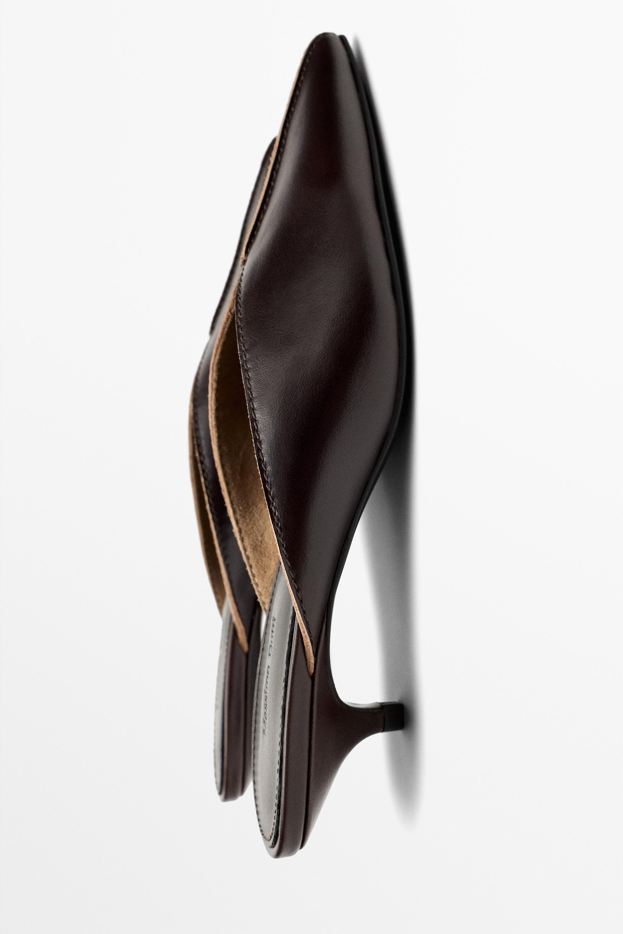 Heeled mule shoe